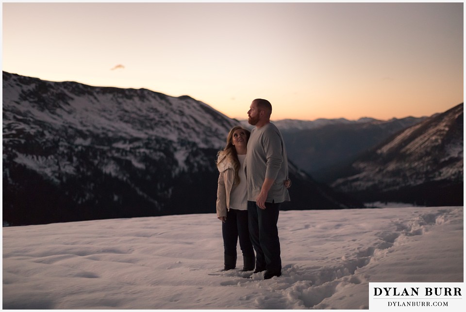 colorado mountain engagement session knee deep of snow at the mountain pass