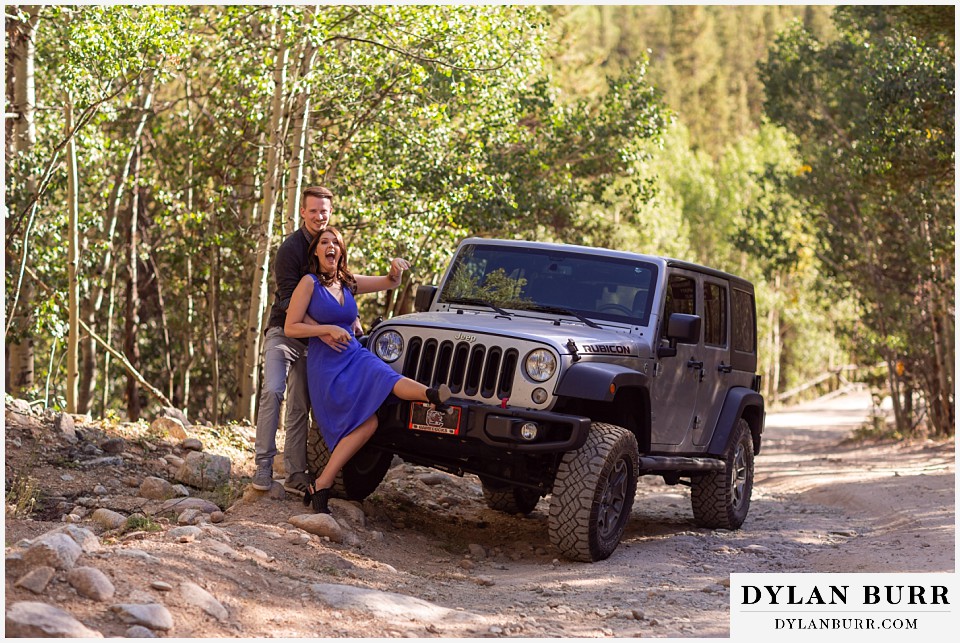 colorado mountain enagagement photos couple being goofy together on jeep trail