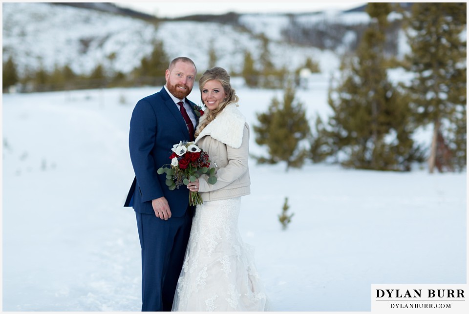 devils thumb ranch wedding in winter wedding couple mountains