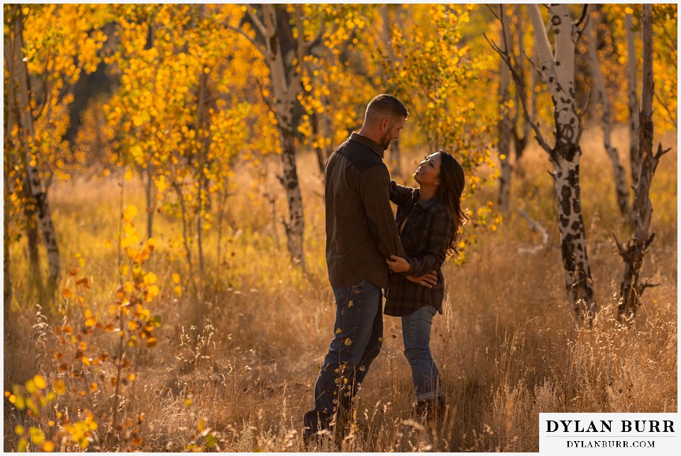 engagement photos golden colorado photographer couple dancing in the mountains together