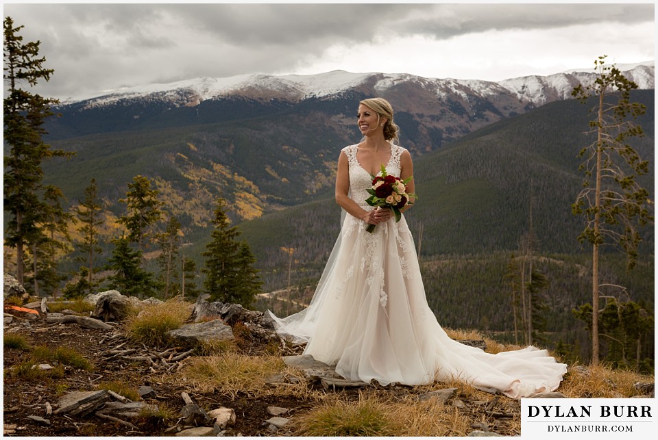the lodge at sunspot wedding winter park bride on top of mountain