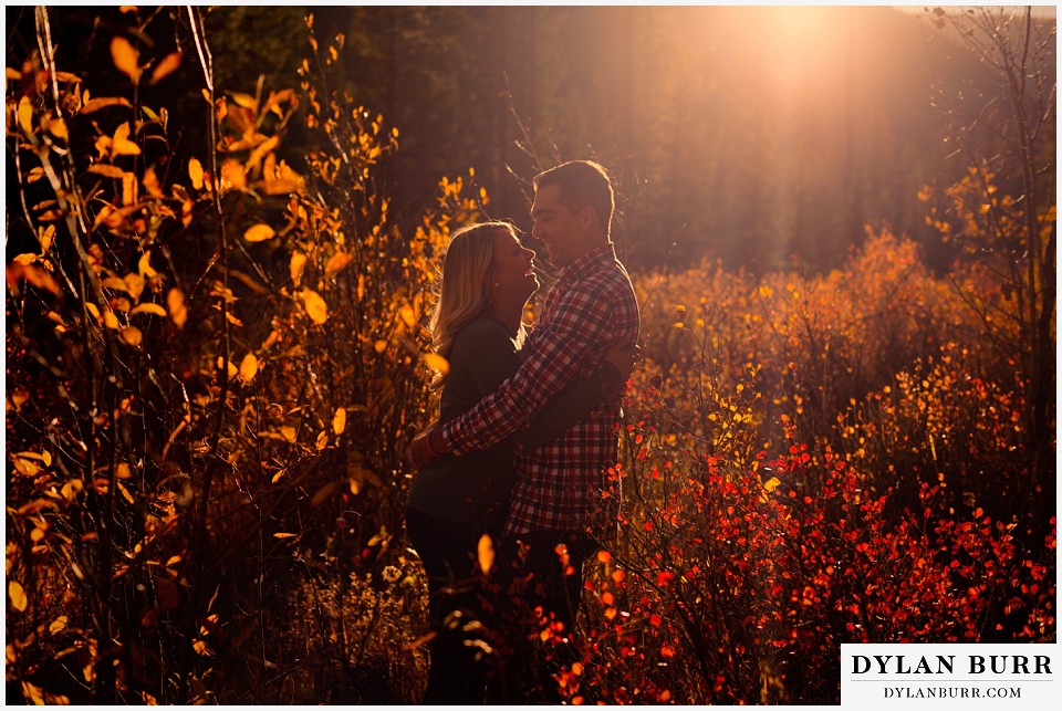 how to prepare for my engagement session couple laughing during sunset