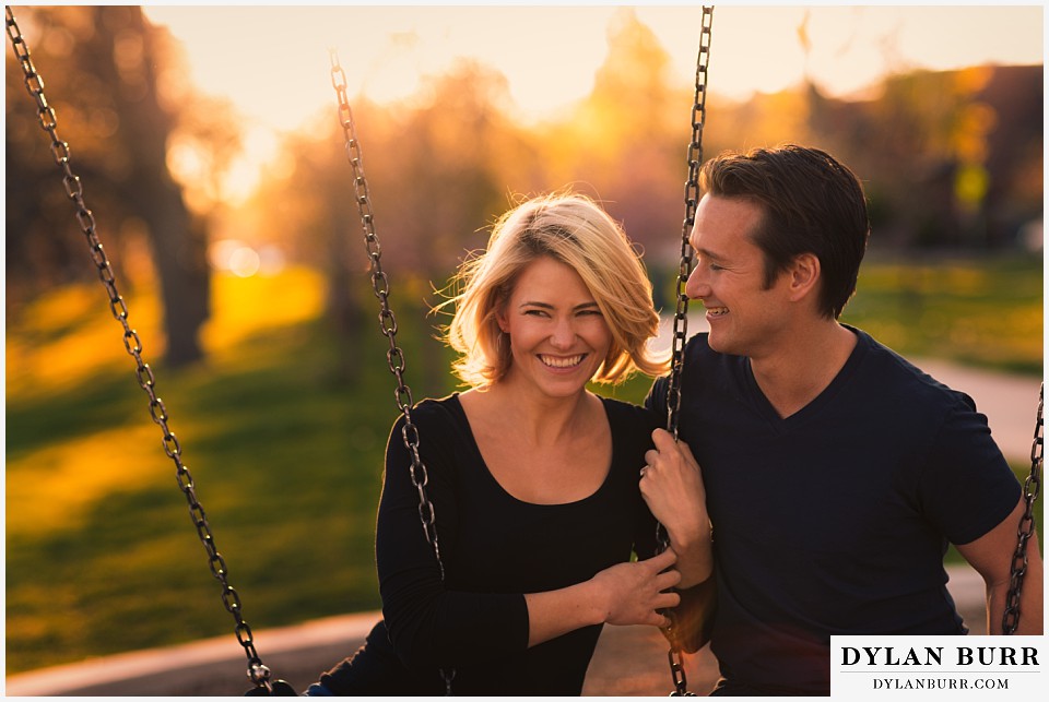 how to prepare for my engagement session couple having fun on swings at sunset