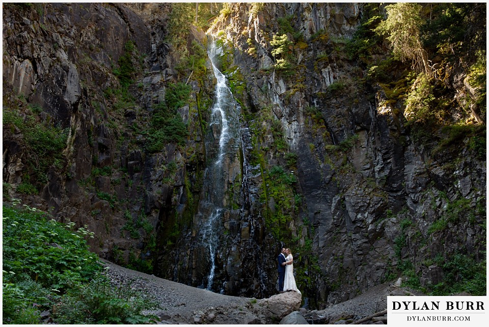 uncompahgre national forest colorado elopement wedding adventure bride and groom with waterfall