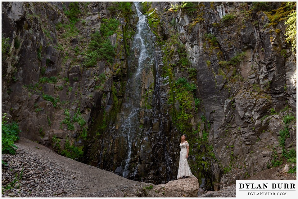 uncompahgre national forest colorado elopement wedding adventure bride alone at waterfall 