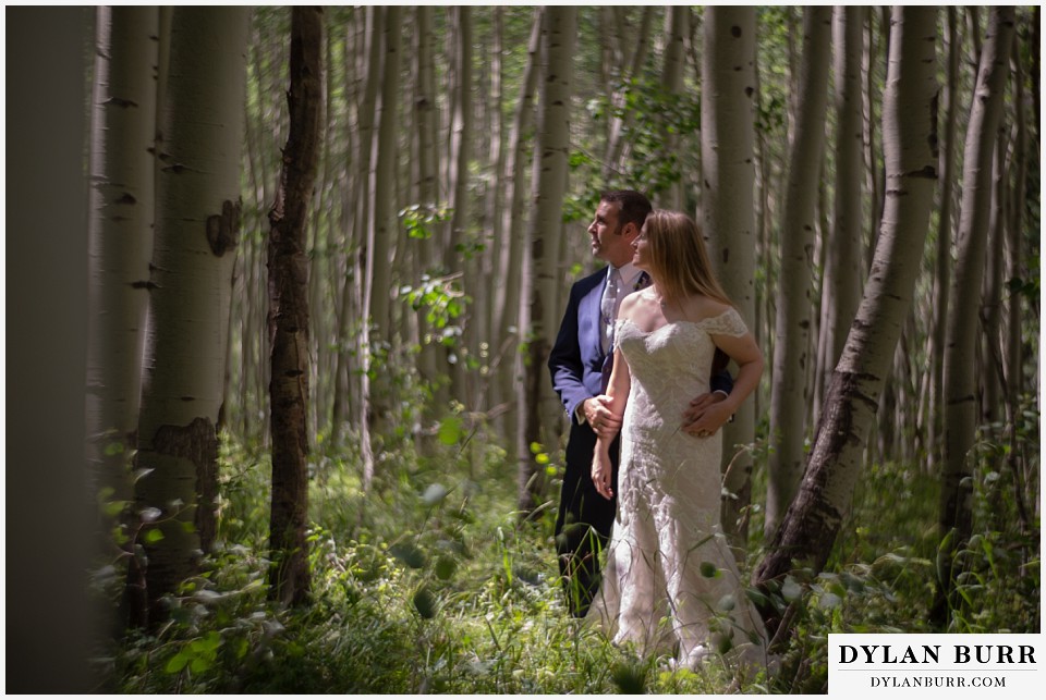 uncompahgre national forest colorado elopement wedding adventure bride and groom deep in aspen tree grove petzval lens