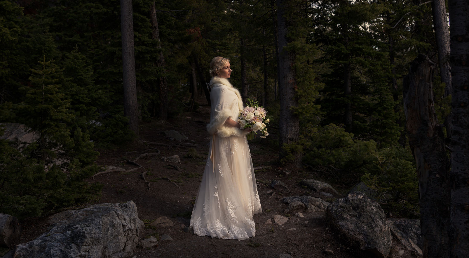 bride in trees grand teton national park wedding