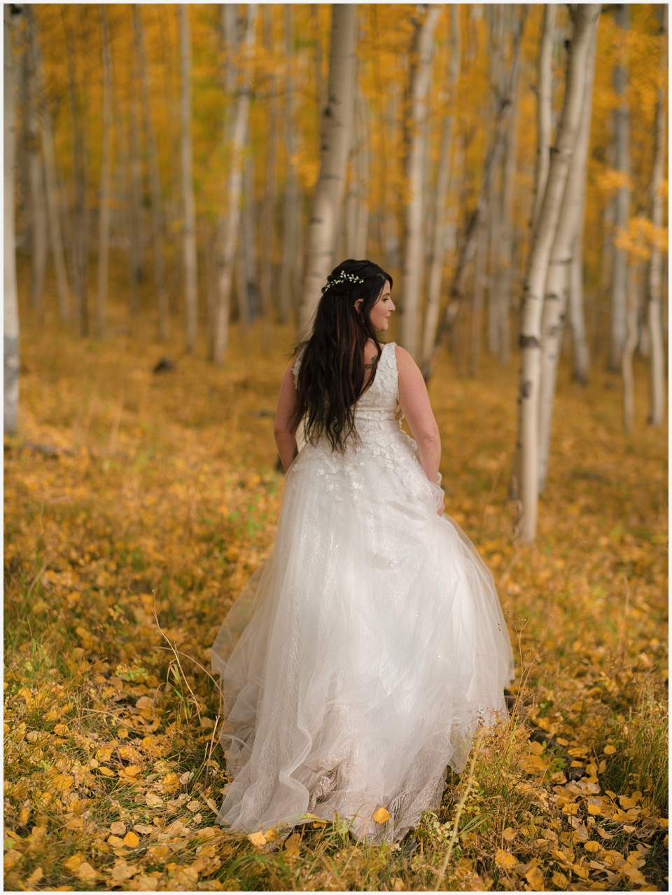 adventure elopement western colorado bride in gold aspen trees in the fall