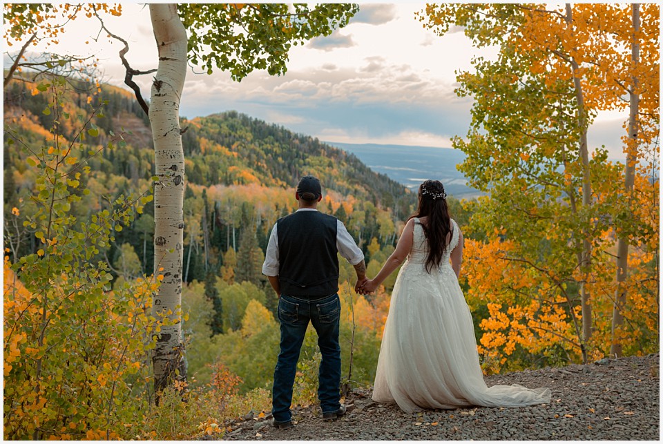 adventure elopement western colorado couple enjoying the sunset in western colorado mountains in the fall