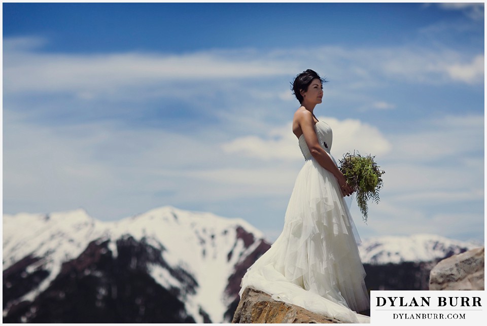 aspen wedding elopement bride with bouquet on mountain top