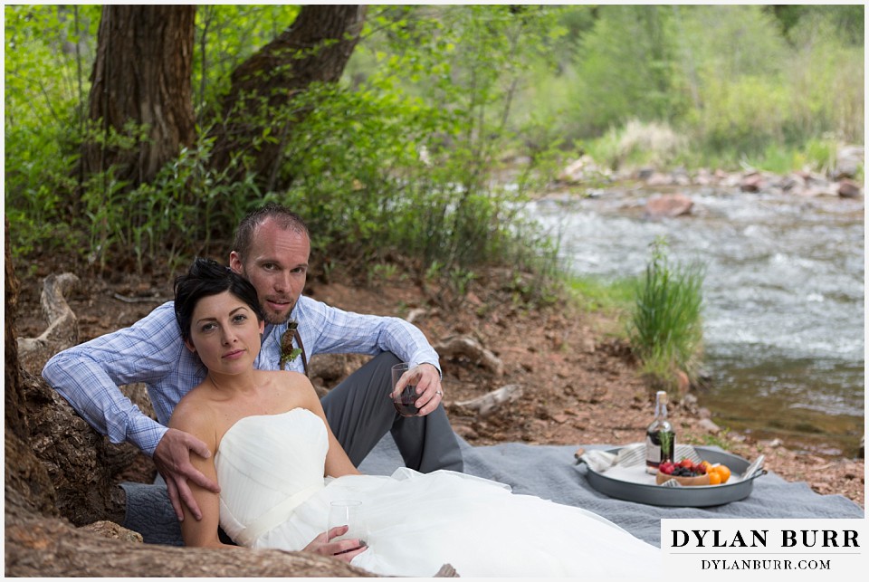 aspen wedding elopement bride and groom with mini picnic along river