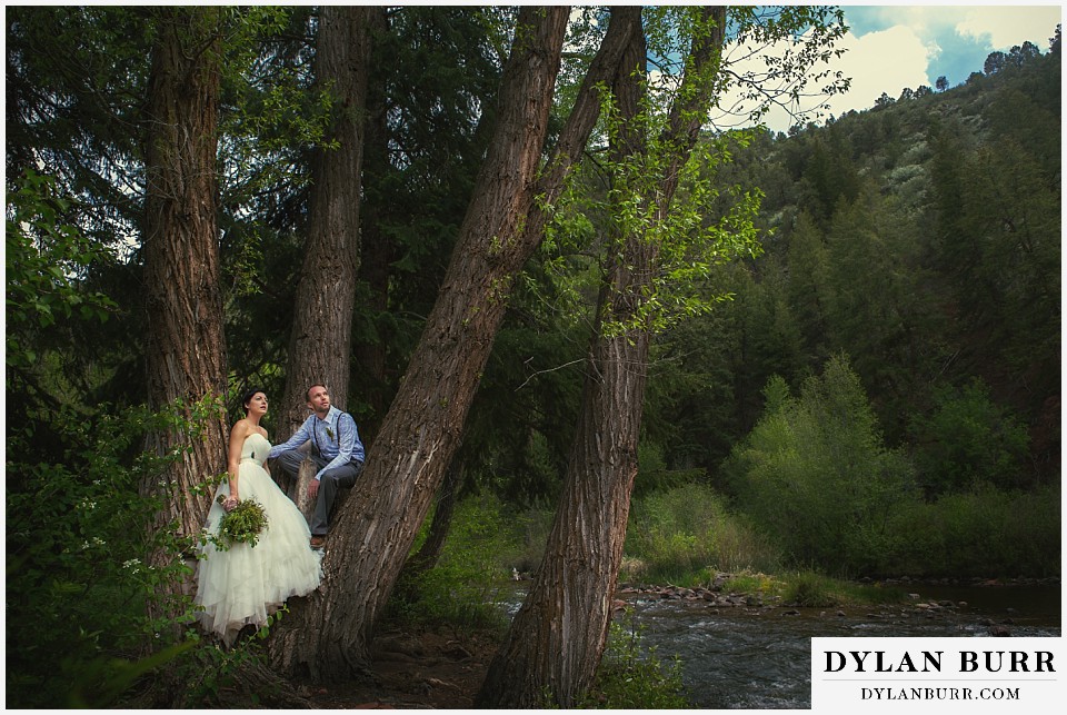 aspen wedding elopement looking out from tree on river