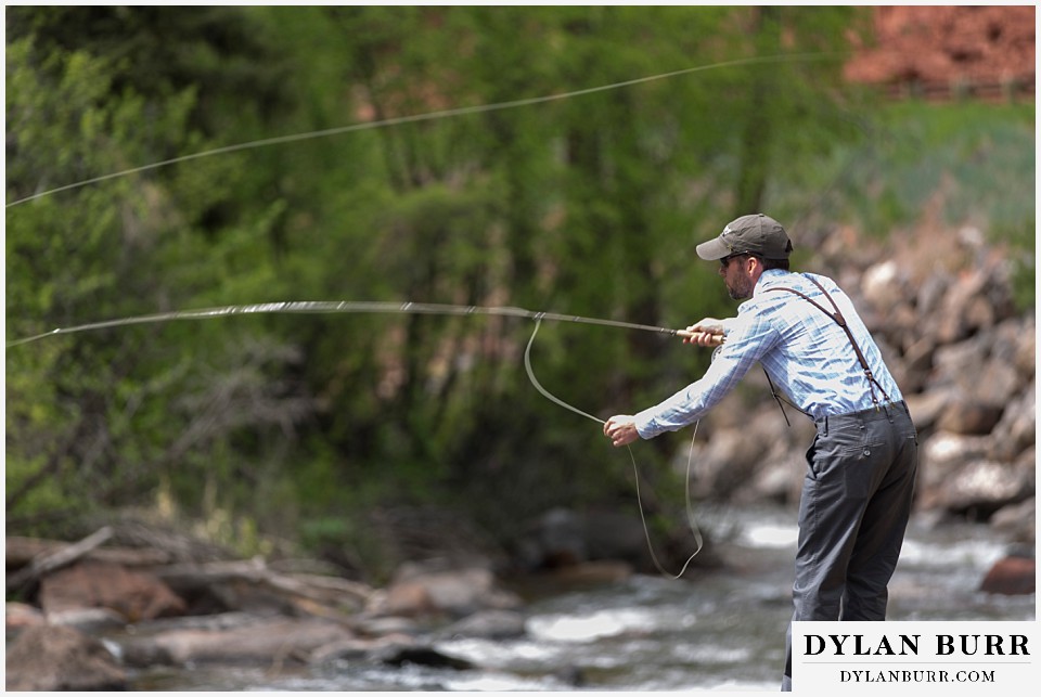 aspen wedding elopement groom fly fishing casting out