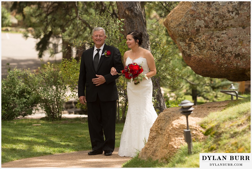 black canyon inn wedding estes park colorado bride and father entering ceremony