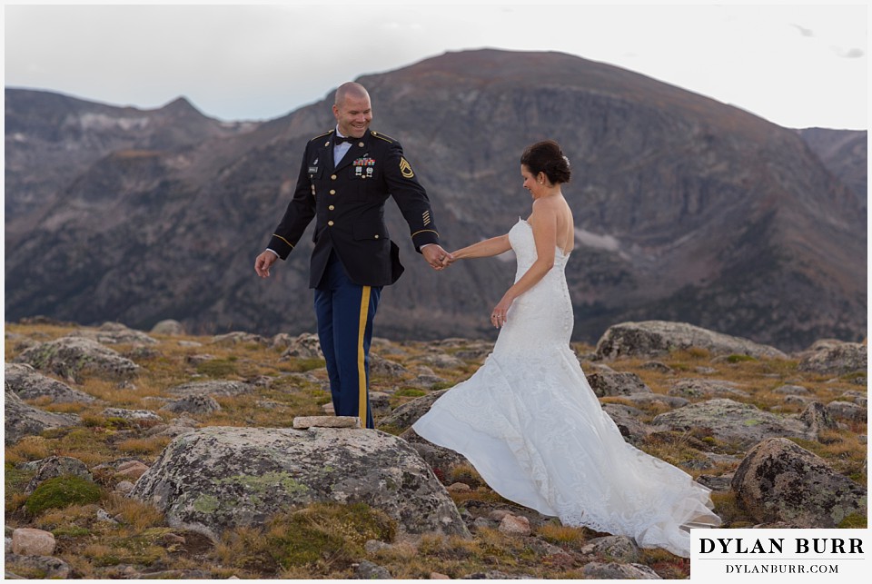 rocky mountain national park adventure wedding colorado bride and groom on mountain top