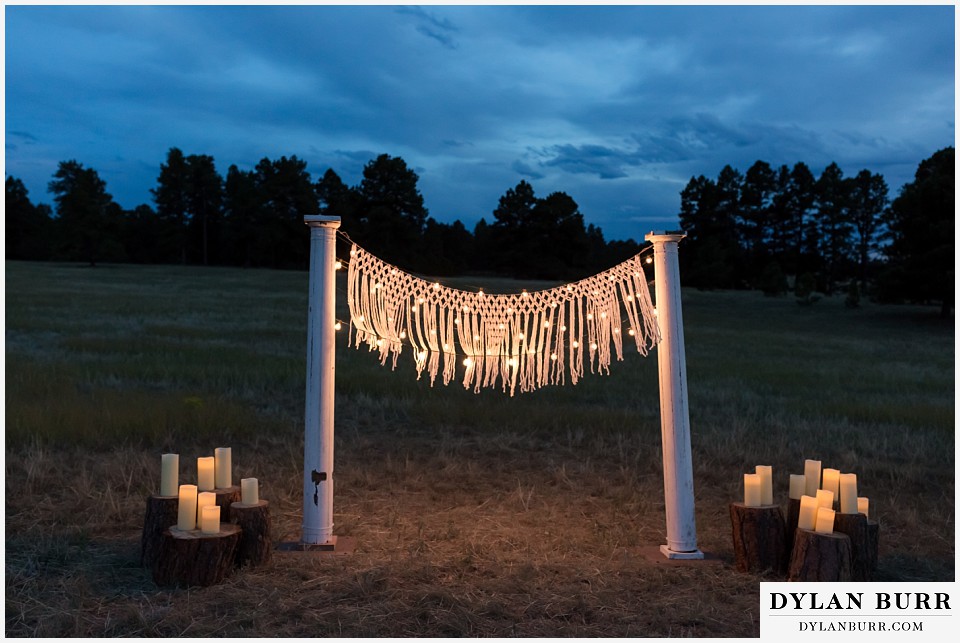 boho backyard colorado wedding string lights and macrame and candles