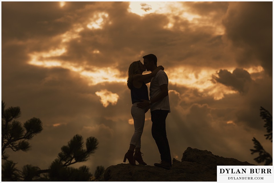 boulder sunset engagement session kiss