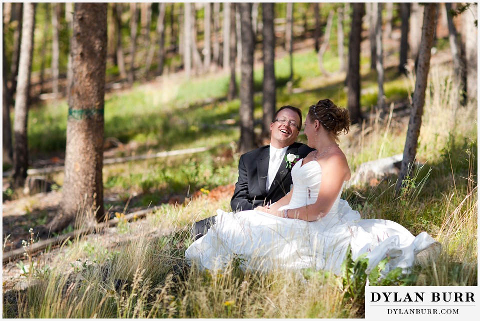 breckenridge 4wd adventure wedding couple laughing in field in mountain