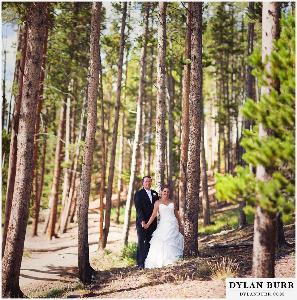 breckenridge 4wd adventure wedding couple together with tall pine trees