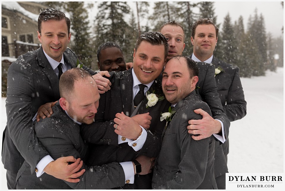 breckenridge nordic center wedding colorado mountain wedding photographer groomsmen in snow