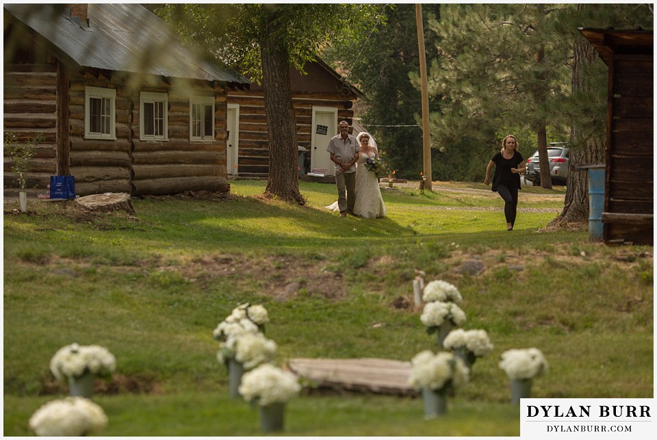 buford lodge wedding buford colorado meeker bride and her father walking down aisle