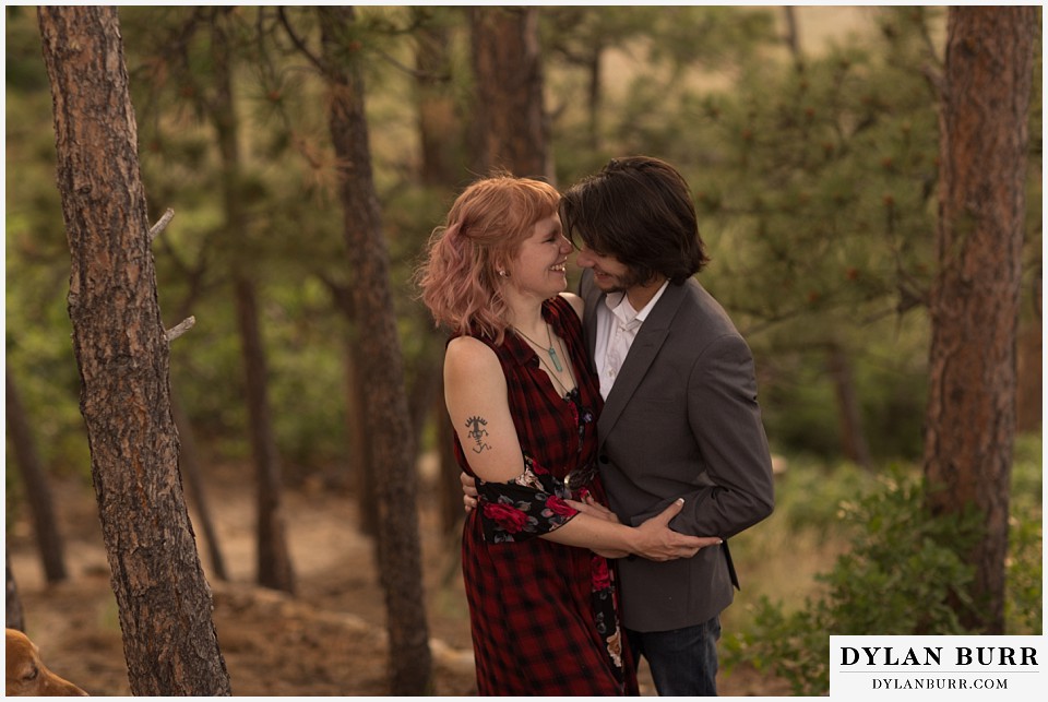 castle rock colorado engagement session last laughs while on a hike in the mountains