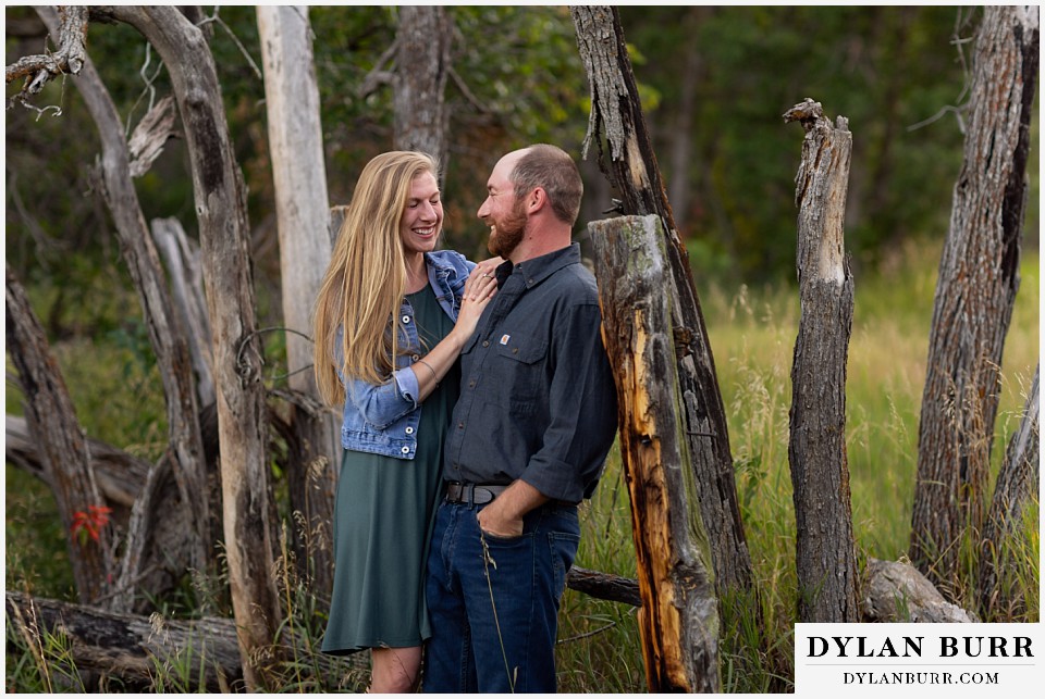castlewood canyon engagement photos couple laughing together