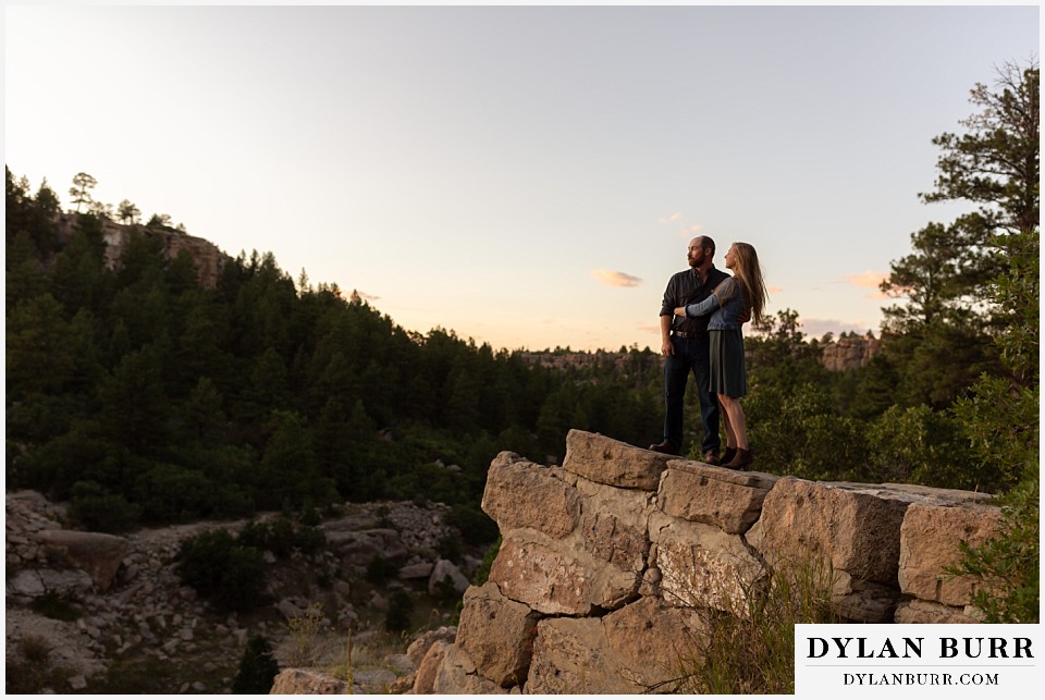 castlewood canyon engagement photos couple on rocks with canyon view in background