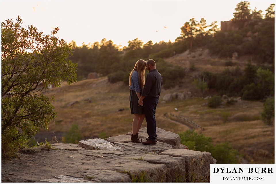 castlewood canyon engagement photos couple coming in close with words of love