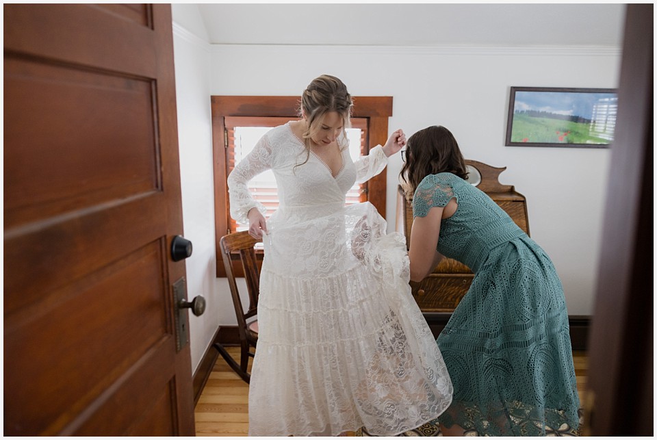 chautauqua community house wedding bride getting ready with best friend maid of honor