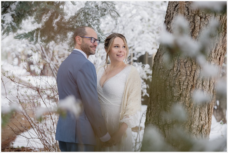 chautauqua community house wedding couple together in pine trees