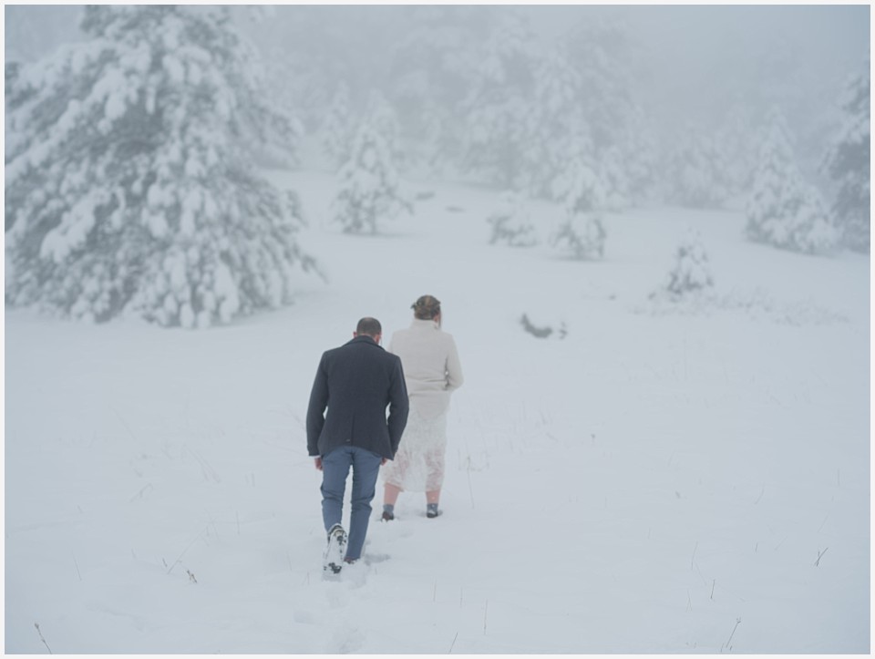 chautauqua community house wedding hiking into the snow and fog