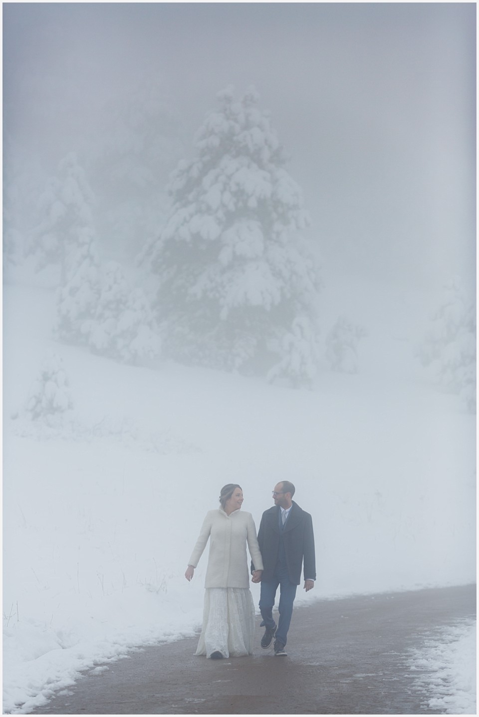 chautauqua community house wedding huge foggy snowy trees and newlyweds