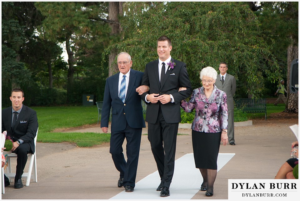 cheesman park pavilion wedding groom walking down aisle with grandparents
