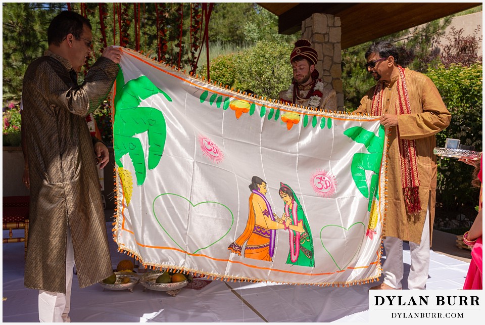 cielo at castle pines wedding colorado mountain wedding sheet being raised during hindu wedding ceremony