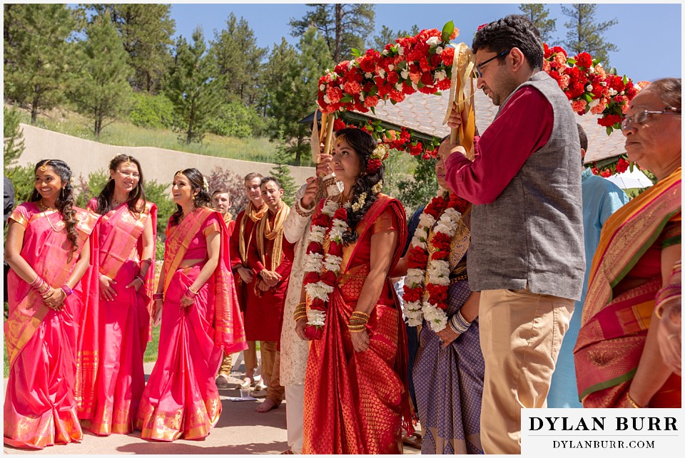 cielo at castle pines wedding colorado mountain wedding bride and bridesmaid hindu wedding ceremony