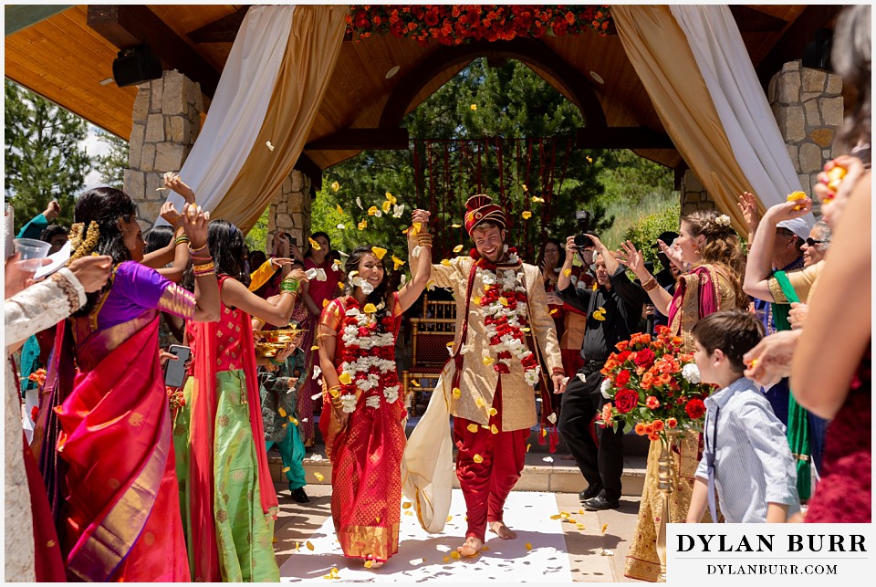 cielo at castle pines wedding colorado mountain wedding bride and groom exiting hindu ceremony