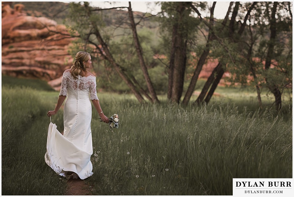 colorado bridal portrait session lace shrug walking in a field