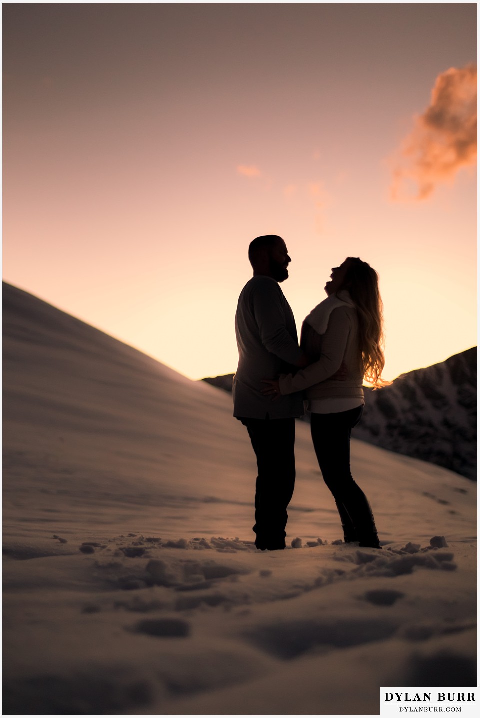 colorado mountain engagement session laughing in silhouette