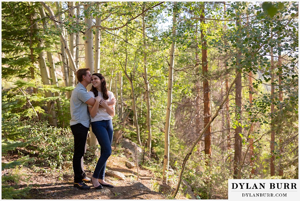 colorado mountain engagement photos colorado wedding photographer dylan burr holding each other and laughing