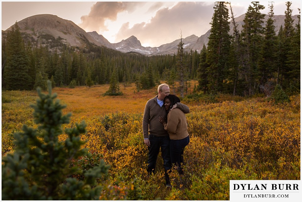 colorado mountain engagement photos couple in golden fall meadow