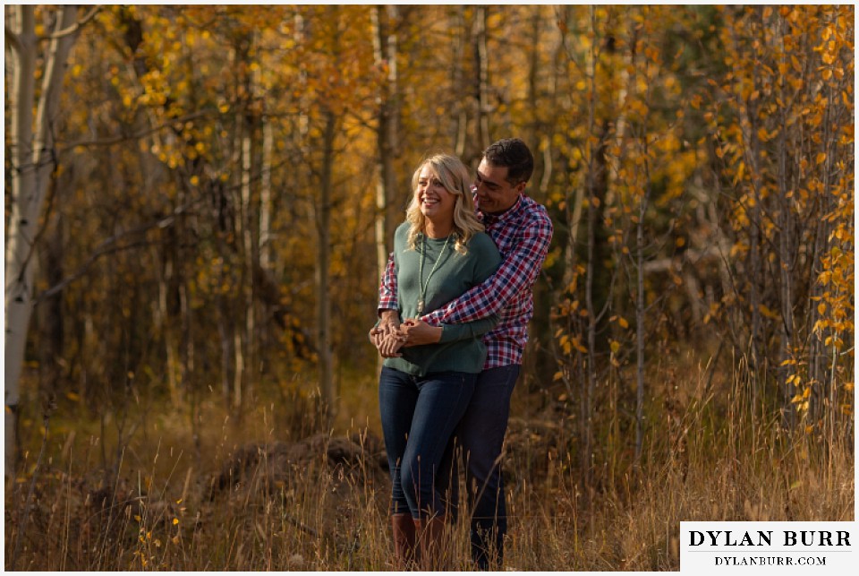 colorado mountain engagement session holding each other