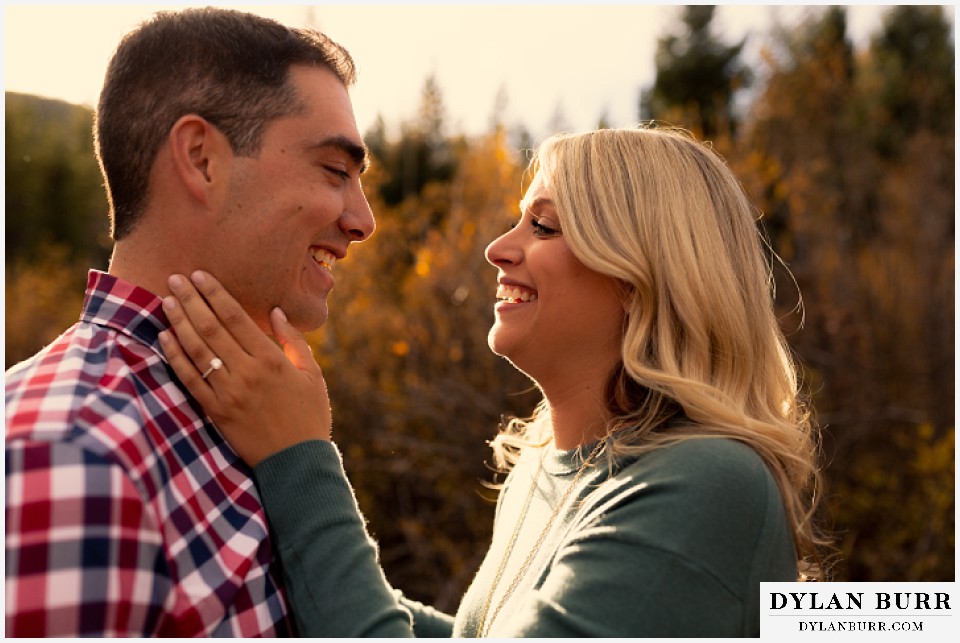 colorado mountain engagement session laughing in colorado sun