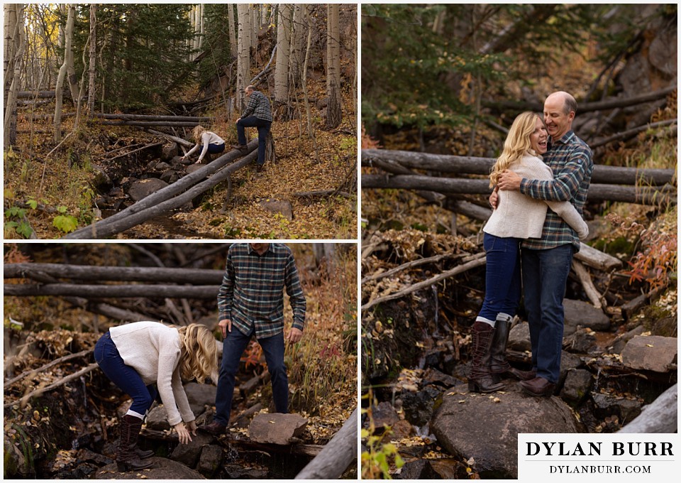 colorado engagement session in mountains couple crossing a creek together
