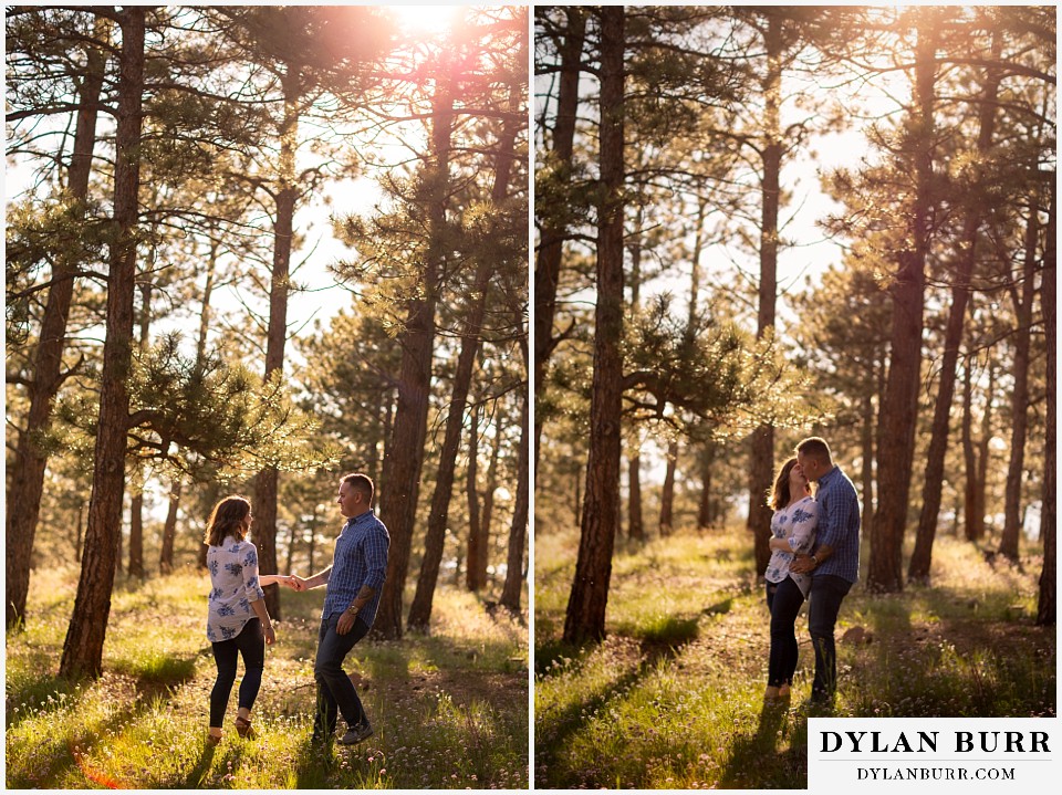 golden colorado mountain enagagement photo session couple dancing in the forest