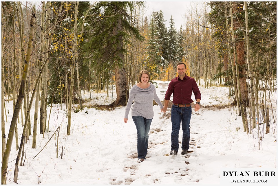 colorado mountain engagement session walking in snow