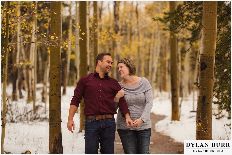 colorado mountain engagement session bride looking with love at her happy groom