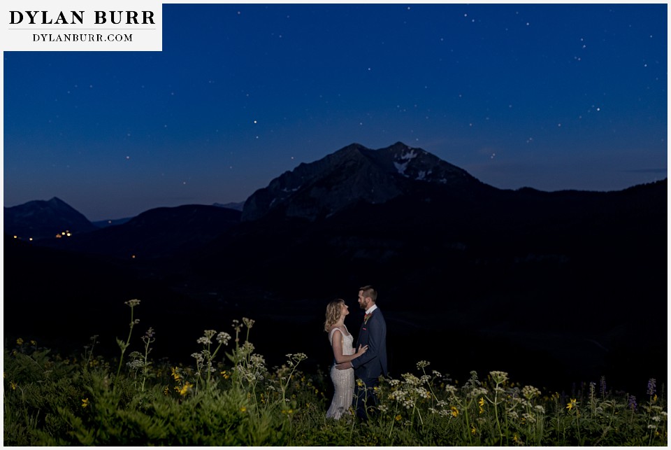 crested butte wedding elopement couple at night with mountains and stars
