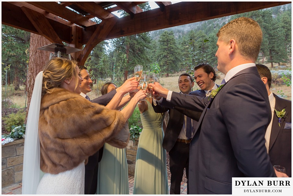 della terra wedding estes park colorado mountain wedding bridal party champagne toast