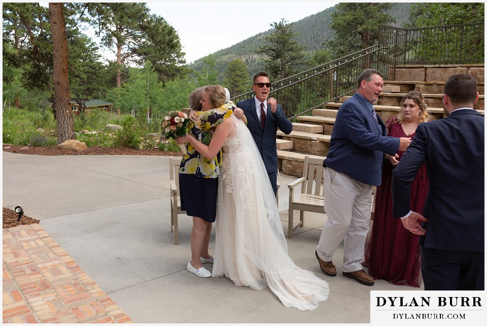 della terra mountain chateau wedding colorado rocky mountain national park wedding rmnp elopement bride hugging new family